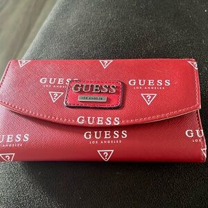 Guess Brand new wallet snap is perfect zipper is perfect excellent condition